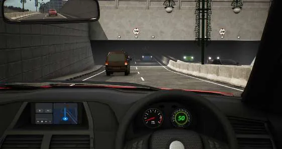 Pandangan dari kursi pengemudi: jalan menuju mulut terowongan yang gelap dengan sebuah mobil di depan, speedometer menunjukkan 50.