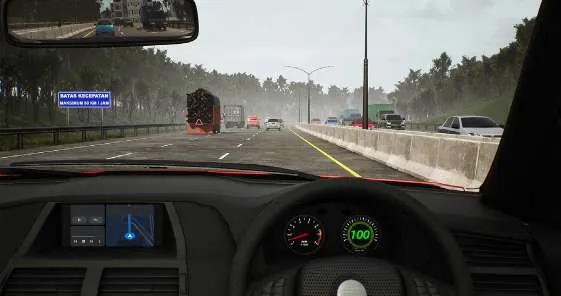 Pandangan dari kursi pengemudi di jalan tol: papan biru batas kecepatan di sisi kiri, speedometer menunjukkan 100.