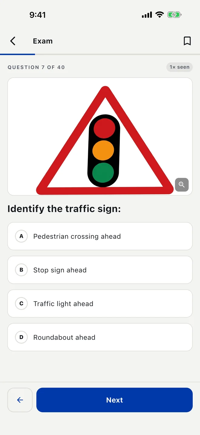 A mock-exam question in English with a road-sign picture.