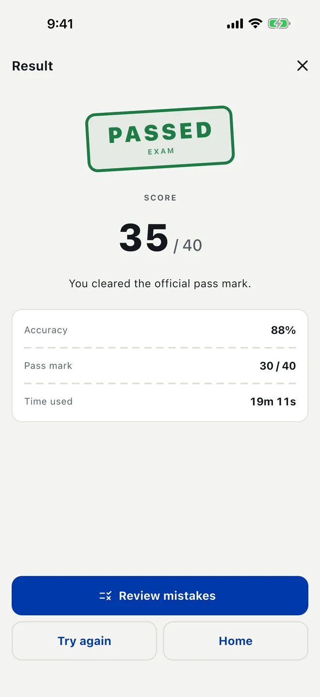 The result of a passed mock exam in English: the sign-plate verdict, score, accuracy and pass mark. The figures are demo data.